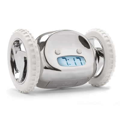 NeXtime Clocks Clocky Chrome alarm clock on wheels with a sleek chrome finish and digital display, mobile alarm clock design.