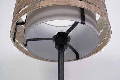 Black metal floor lamp stand with E27 socket, measuring 157x35 cm, designed for universal lighting use.
