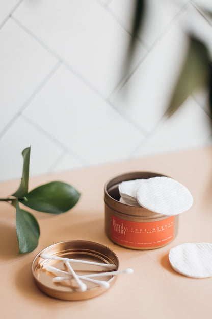 Flambé Fleuri 1001 Nights Candle in decorative tin with intricate floral design and warm, inviting glow.