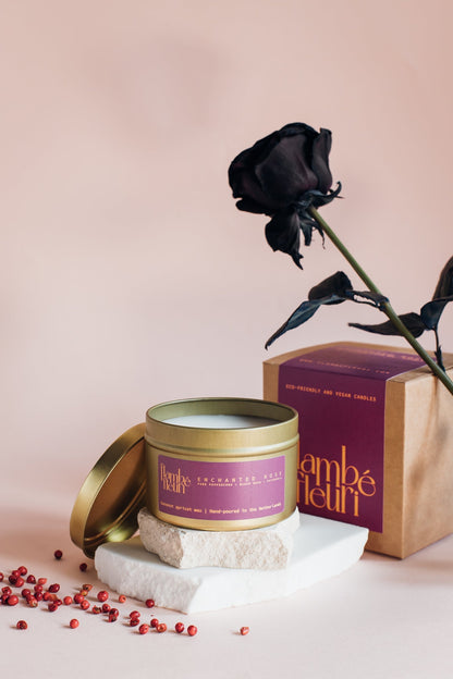 Flambé Fleuri Enchanted Rose Candle in a decorative tin with a detailed rose design, perfect for home decor and ambient lighting.
